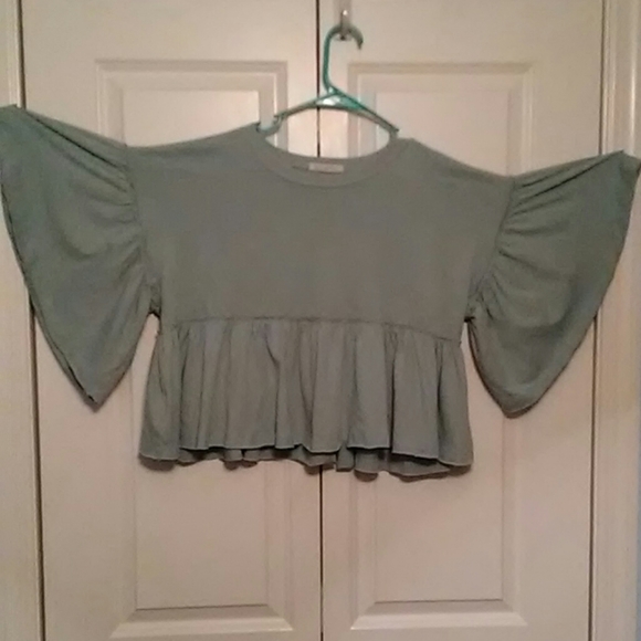 Urban Outfitters Tops - URBAN OUTFITTERS Peplum Light BlueTee